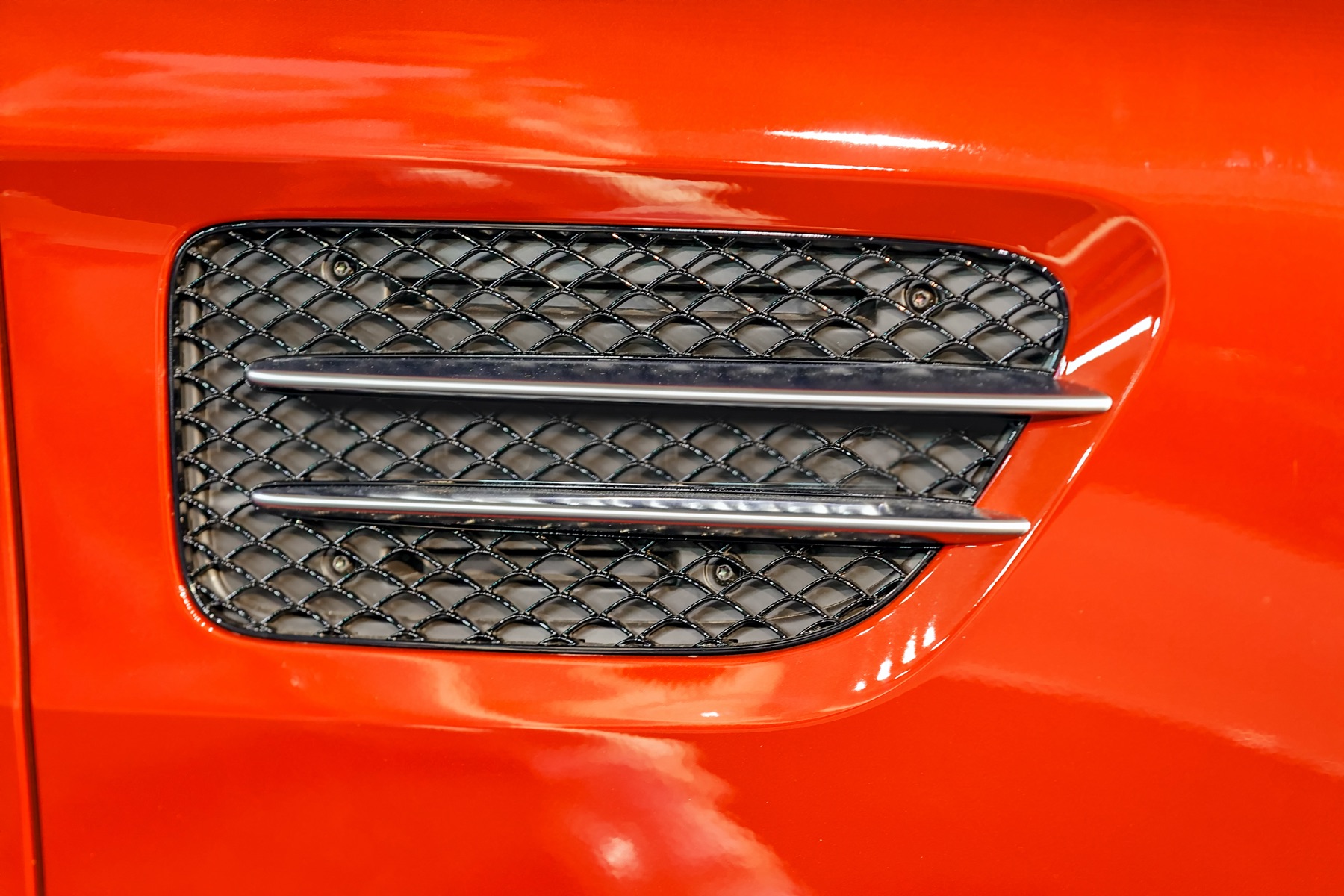 Close detail of an automobile body panel