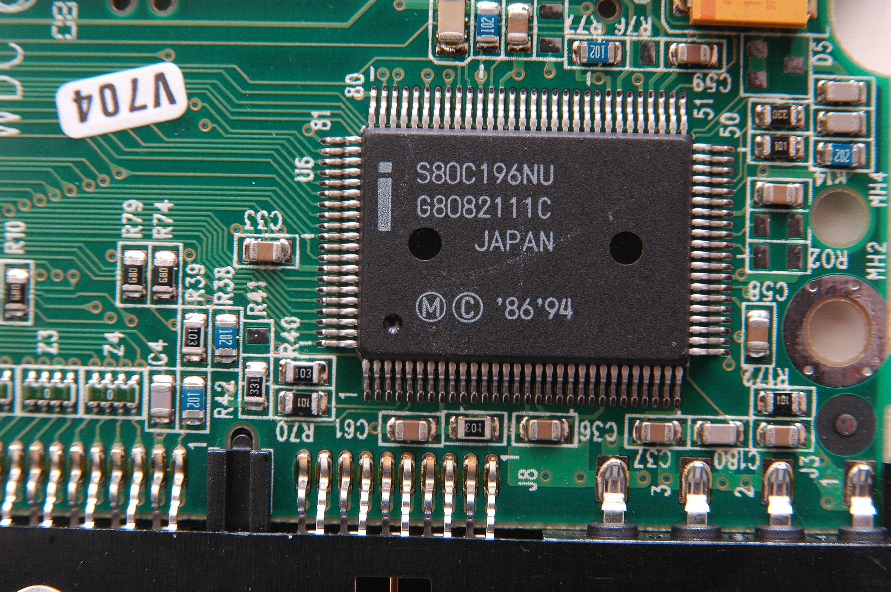 A close-up of a semiconductor chip socket on a circuit board