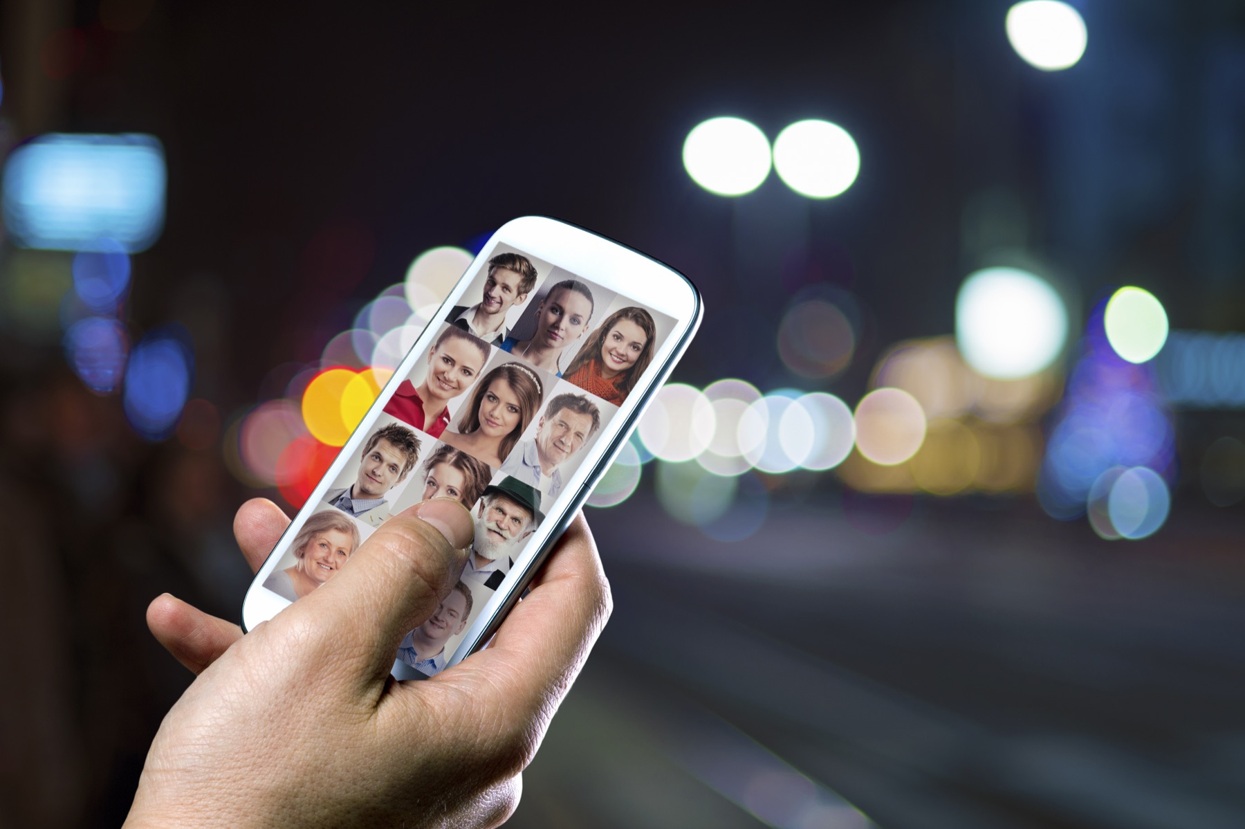 A smartphone displaying a face-swapping app interface against a dark background