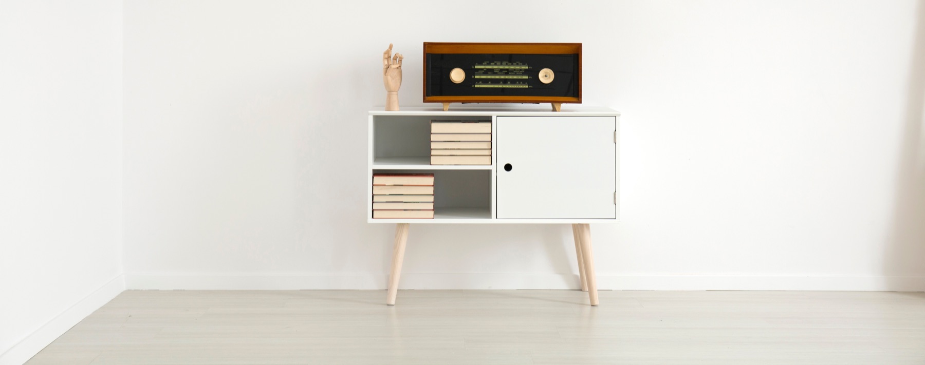 Audio speaker and stereo equipment on a shelf