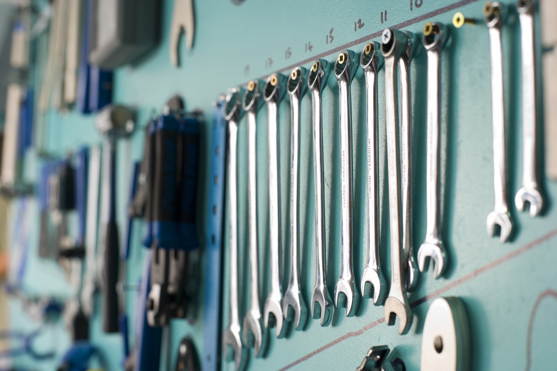 Row of laser printer toner cartridges on a workbench
